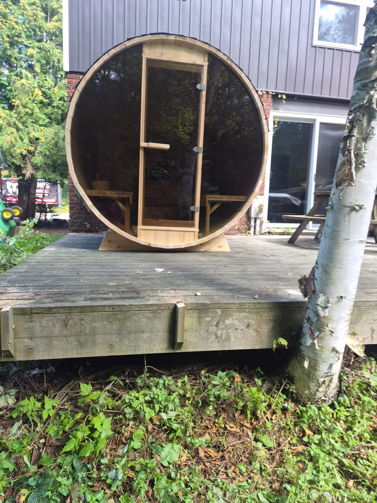 Barrel with optional full-glass front on a deck