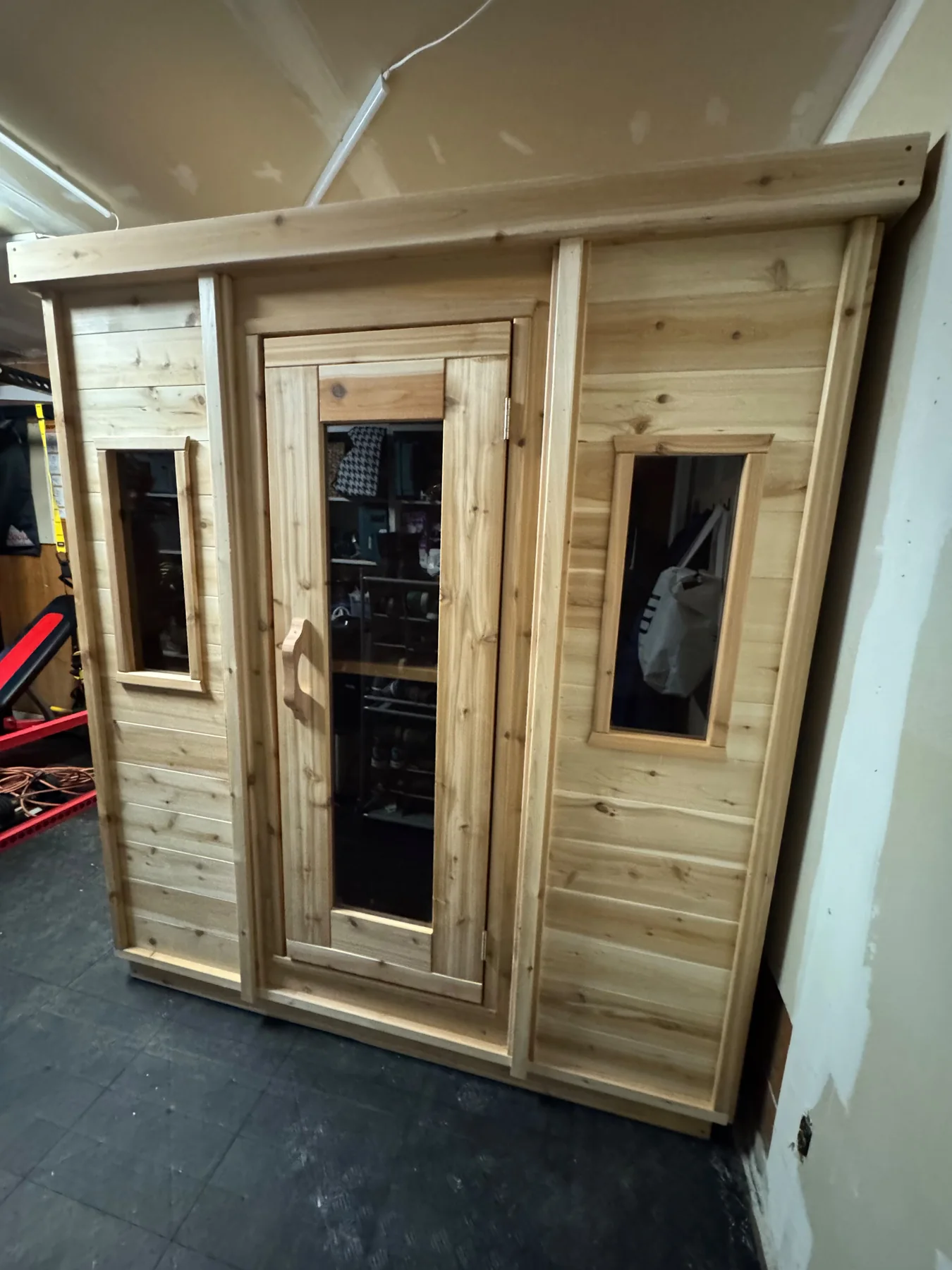 Indoor Sauna front with glass door and windows